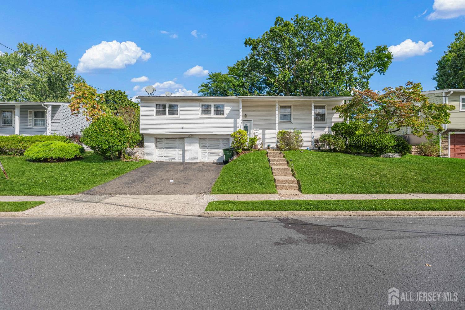 62 Harmon Road Edison, NJ 08837 - Photo 3 of 30 a view of backyard with a garden and plants