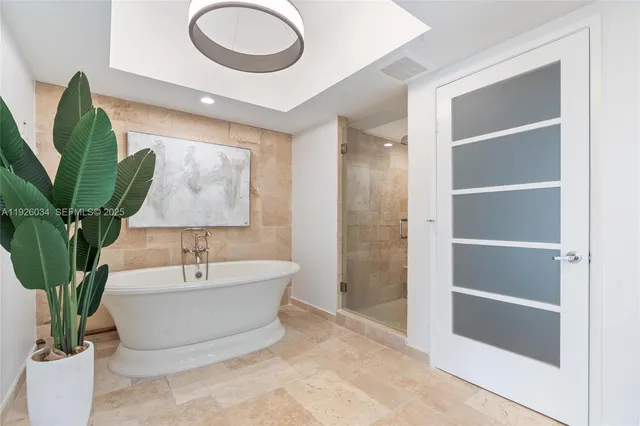a living room with granite countertop furniture and a table