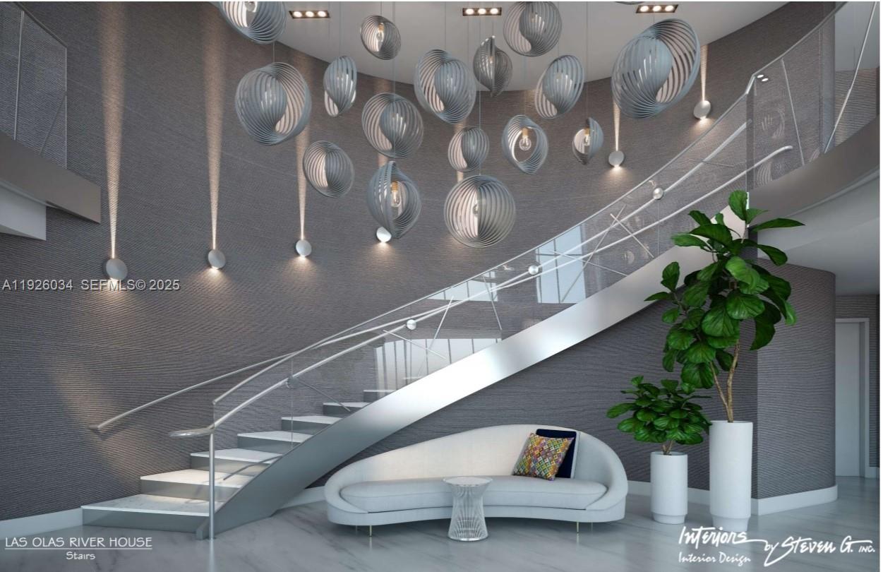 333 Las Olas Way, Unit 2406 Fort Lauderdale, FL 33301 - Photo 10 of 55 a view of staircase with lots of potted plants