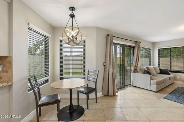 a view of a livingroom with furniture and window