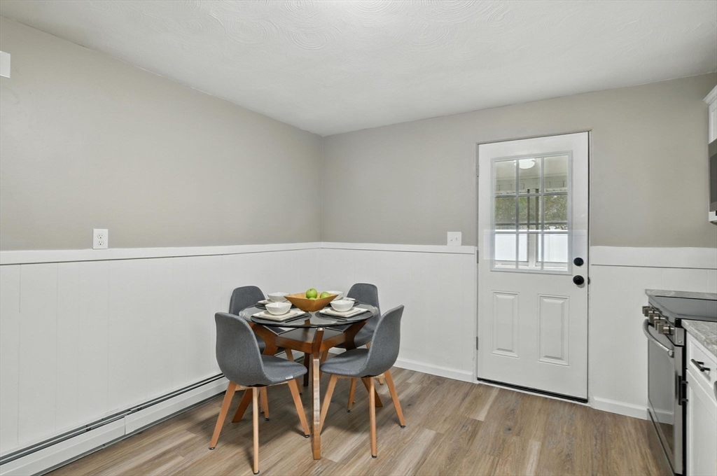 17 Pebble Mill Road Springfield, MA 01118 - Photo 16 of 30 a view of a workspace with furniture and wooden floor