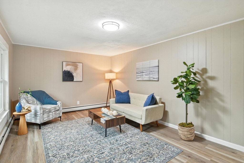 17 Pebble Mill Road Springfield, MA 01118 - Photo 5 of 30 a living room with furniture and wooden floor