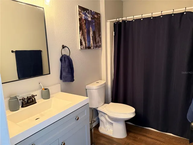 a view of a yard with tree s