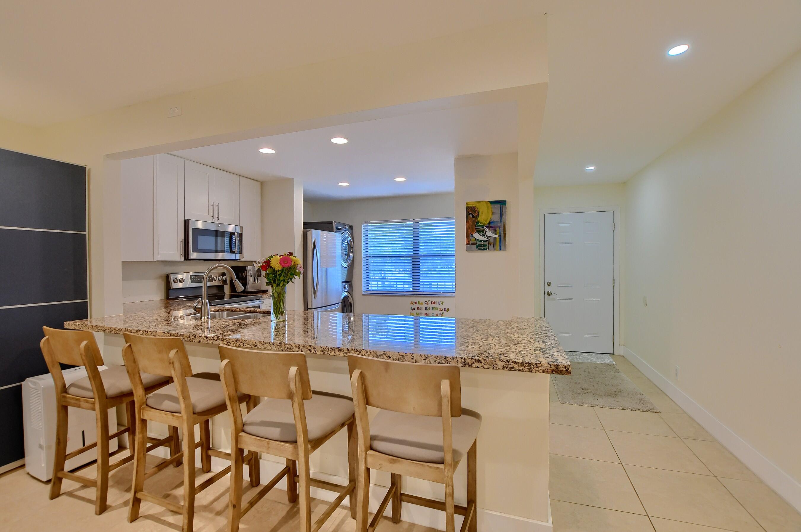 1501 Northwest 13th Street, Unit 14 Boca Raton, FL 33486 - Photo 3 of 24 05_ebf_1705-hdr(5)