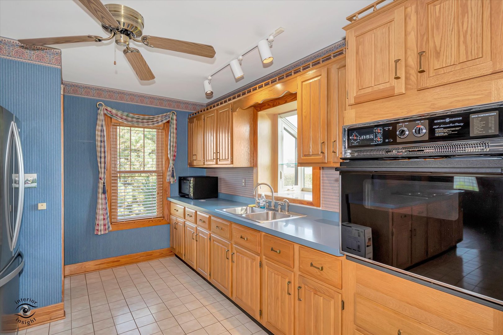 16615 West 2000N Road Reddick, IL 60961 - Photo 3 of 21 a kitchen with stainless steel appliances granite countertop a sink a stove and cabinets