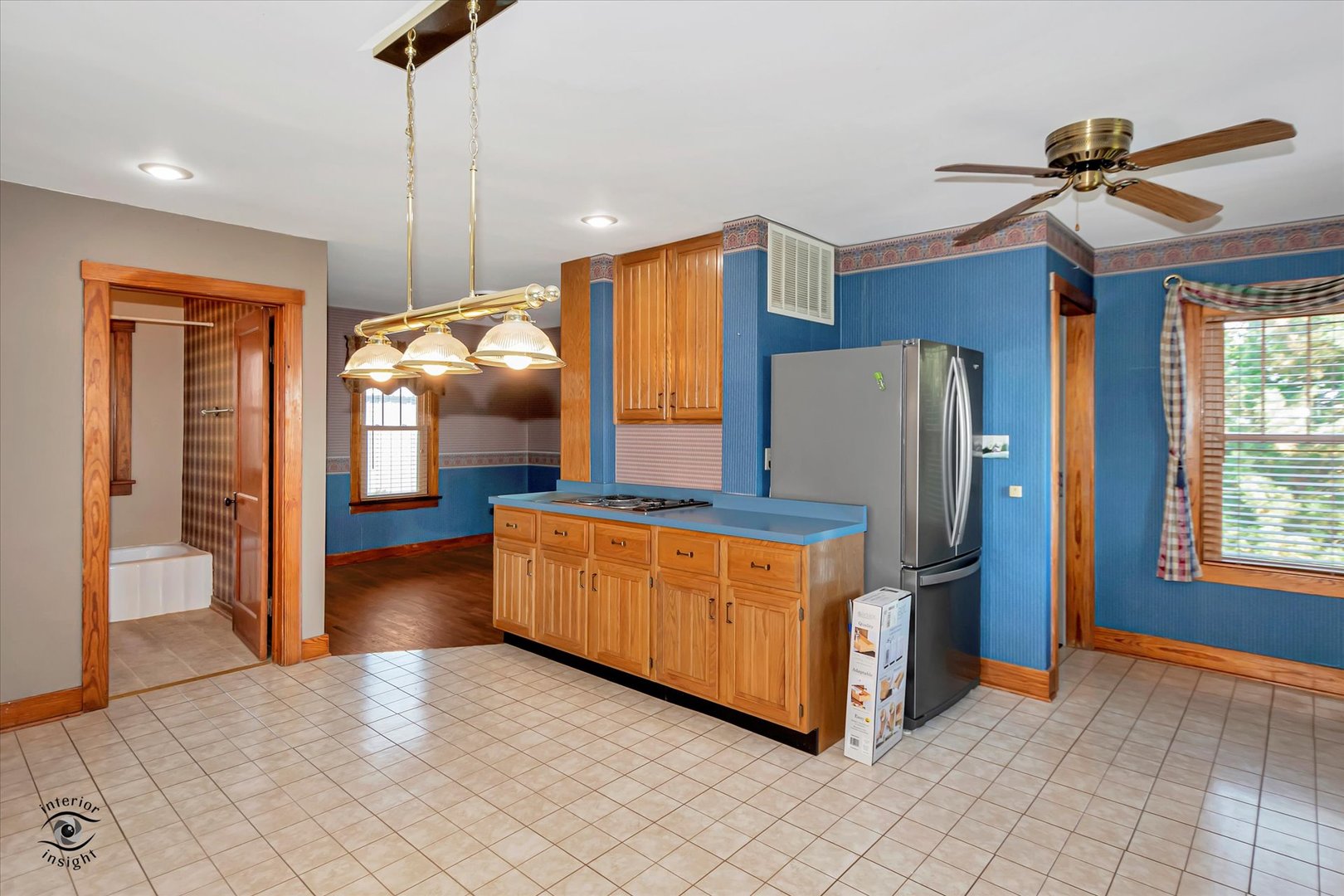 16615 West 2000N Road Reddick, IL 60961 - Photo 4 of 21 a kitchen with stainless steel appliances granite countertop a refrigerator and a sink