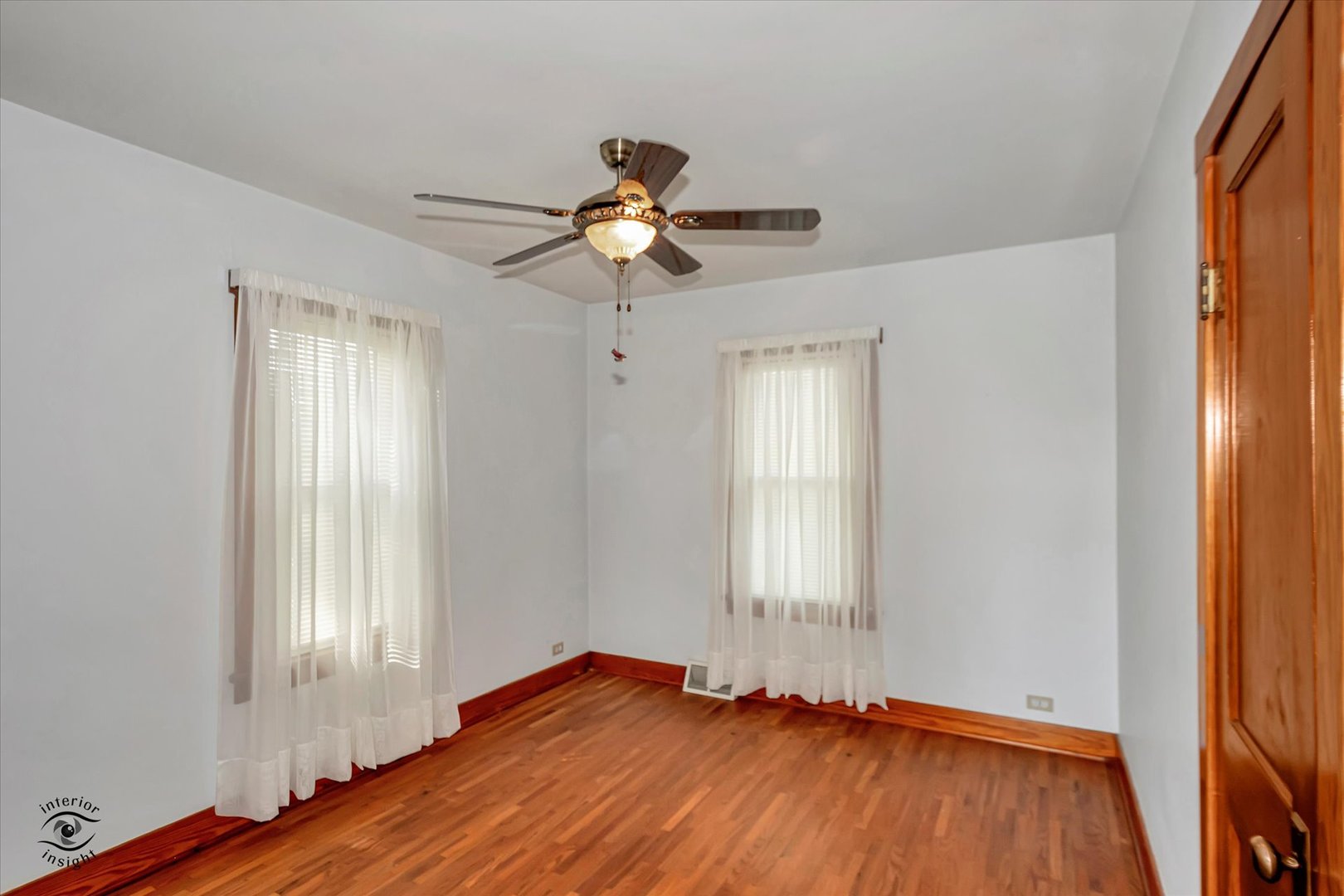 16615 West 2000N Road Reddick, IL 60961 - Photo 7 of 21 a view of empty room with wooden floor and fan