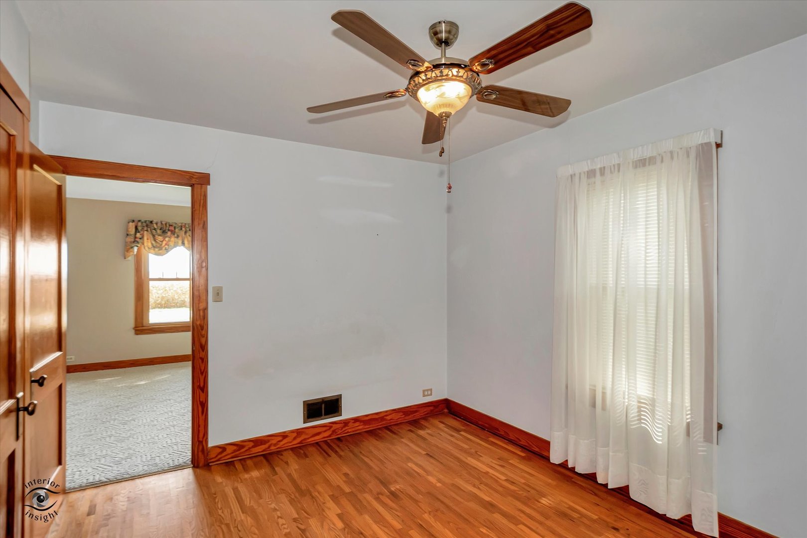 16615 West 2000N Road Reddick, IL 60961 - Photo 8 of 21 wooden floor in an empty room with a window