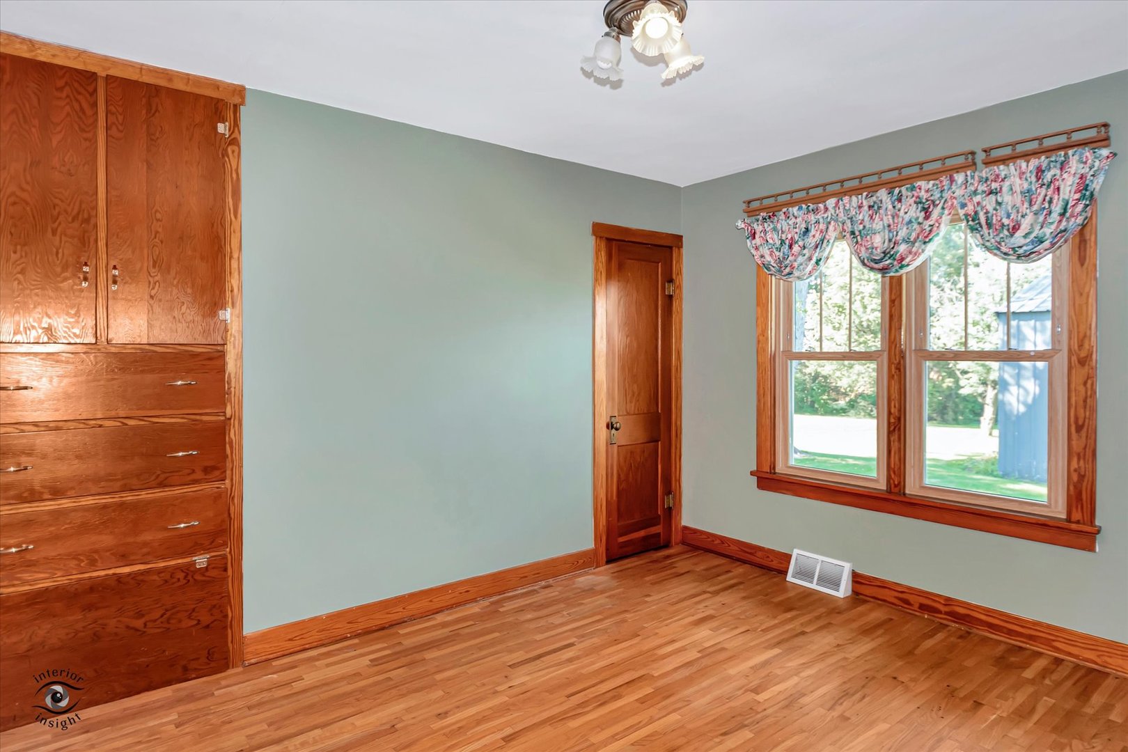16615 West 2000N Road Reddick, IL 60961 - Photo 9 of 21 a view of an empty room with a window and wooden floor