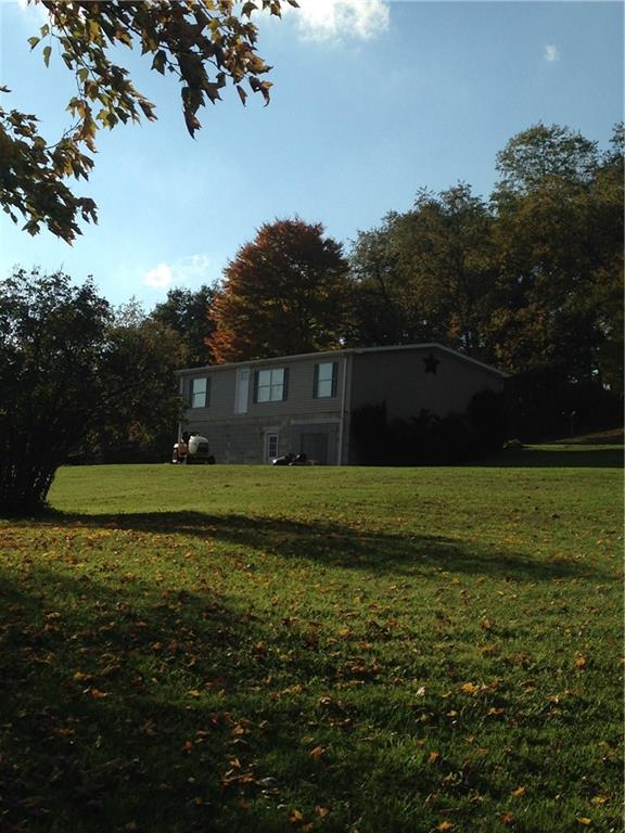 12 year young home sitting on 3 level country acres!!  You will be amazed by the interior of the home!!