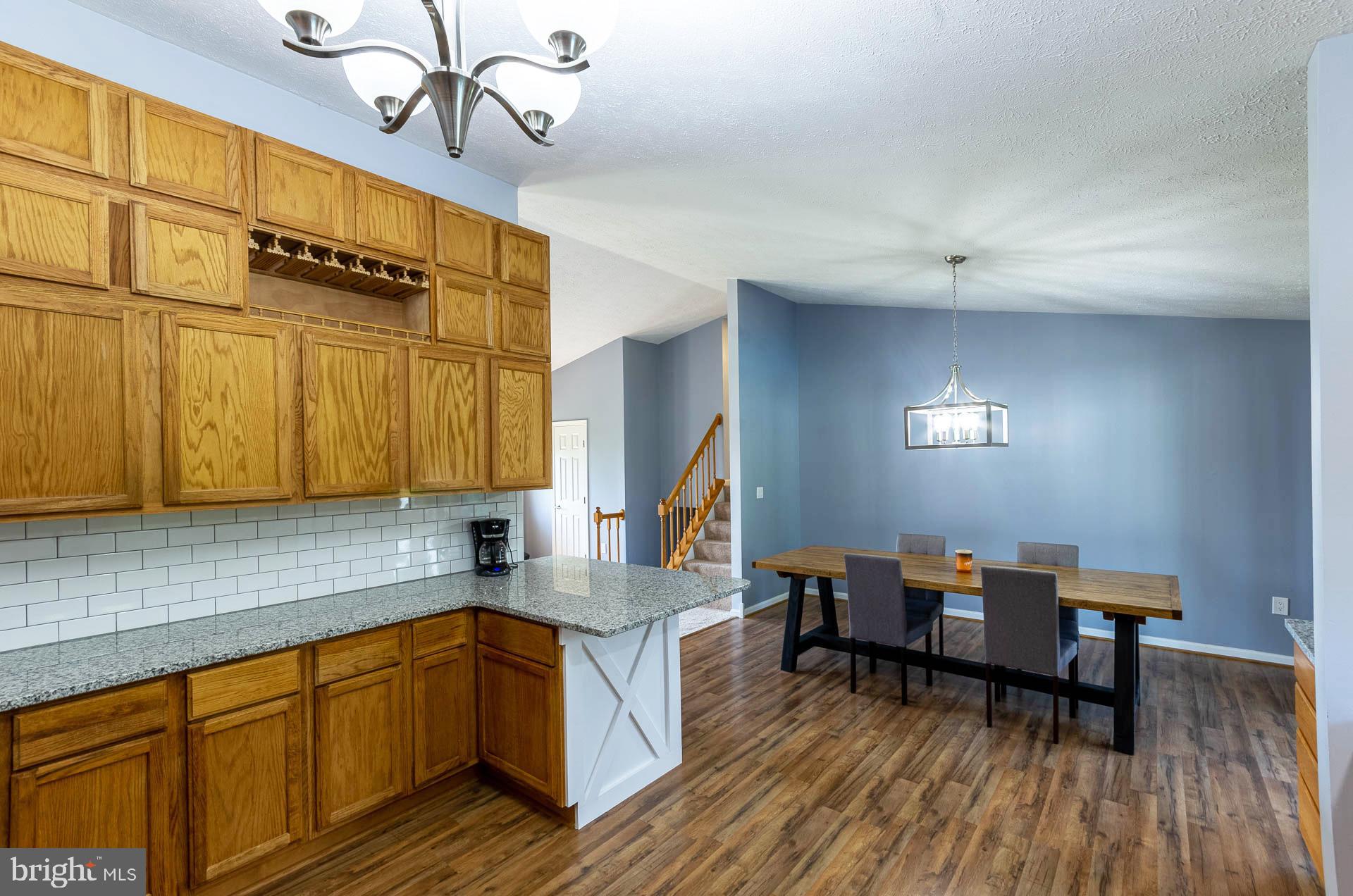 26 Liddell Road Colora, MD 21917 - Photo 11 of 37 a kitchen with a sink cabinets and wooden floor