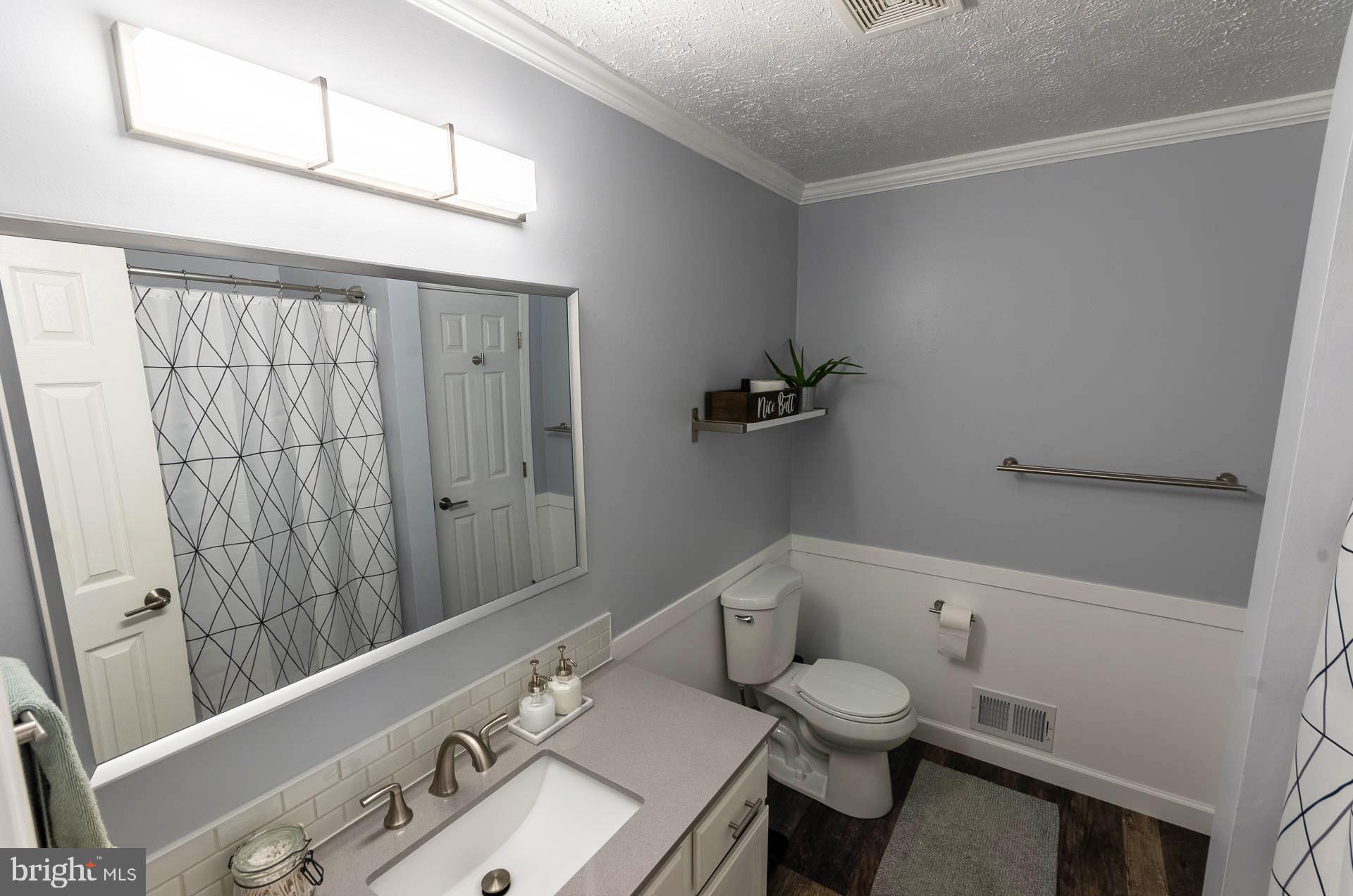 26 Liddell Road Colora, MD 21917 - Photo 16 of 37 a bathroom with a sink a toilet and shower