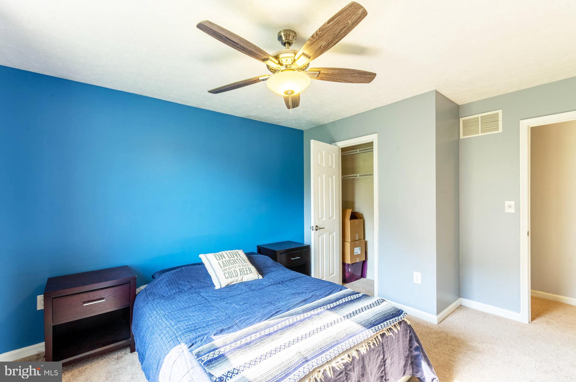 26 Liddell Road Colora, MD 21917 - Photo 25 of 37 a bedroom with a bed and a ceiling fan