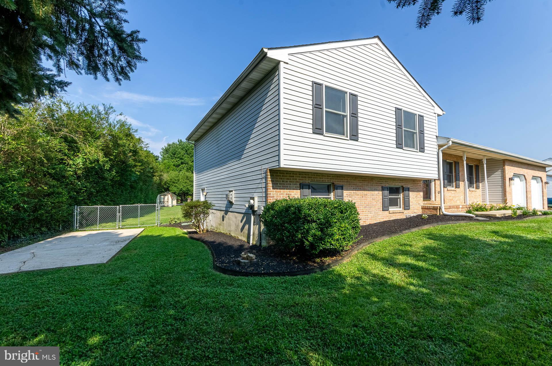 26 Liddell Road Colora, MD 21917 - Photo 4 of 37 a front view of house with a garden and patio
