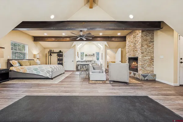 a living room with a couch and a fireplace