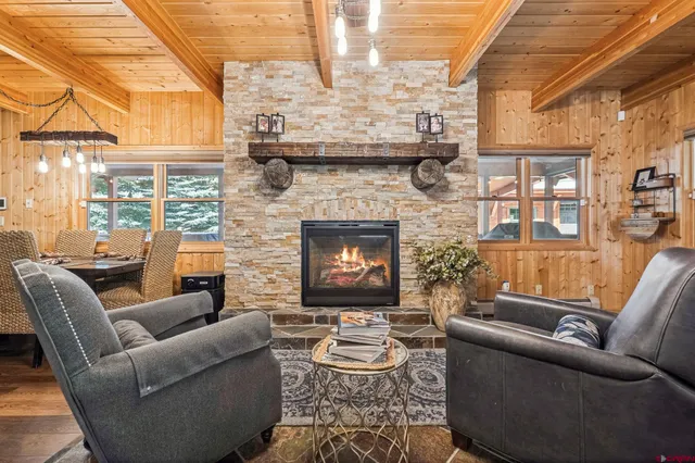 a work room with furniture and a fireplace