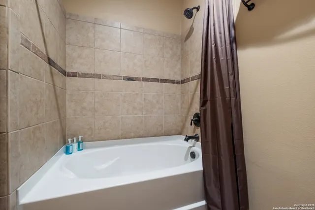 a bathroom with a bathtub