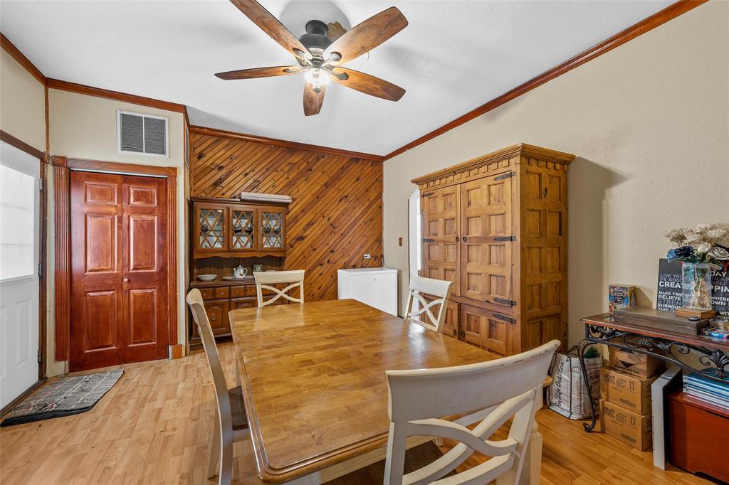 306 South Cleveland Meridian, TX 76665 - Photo 11 of 26 a view of a dining room with furniture window and outside view