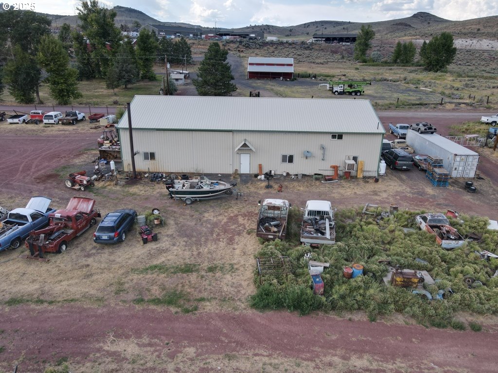 29388 Wrecking Yard Lane Hines, OR 97738 - Photo 25 of 39 an aerial view of a house with garden space and car parked