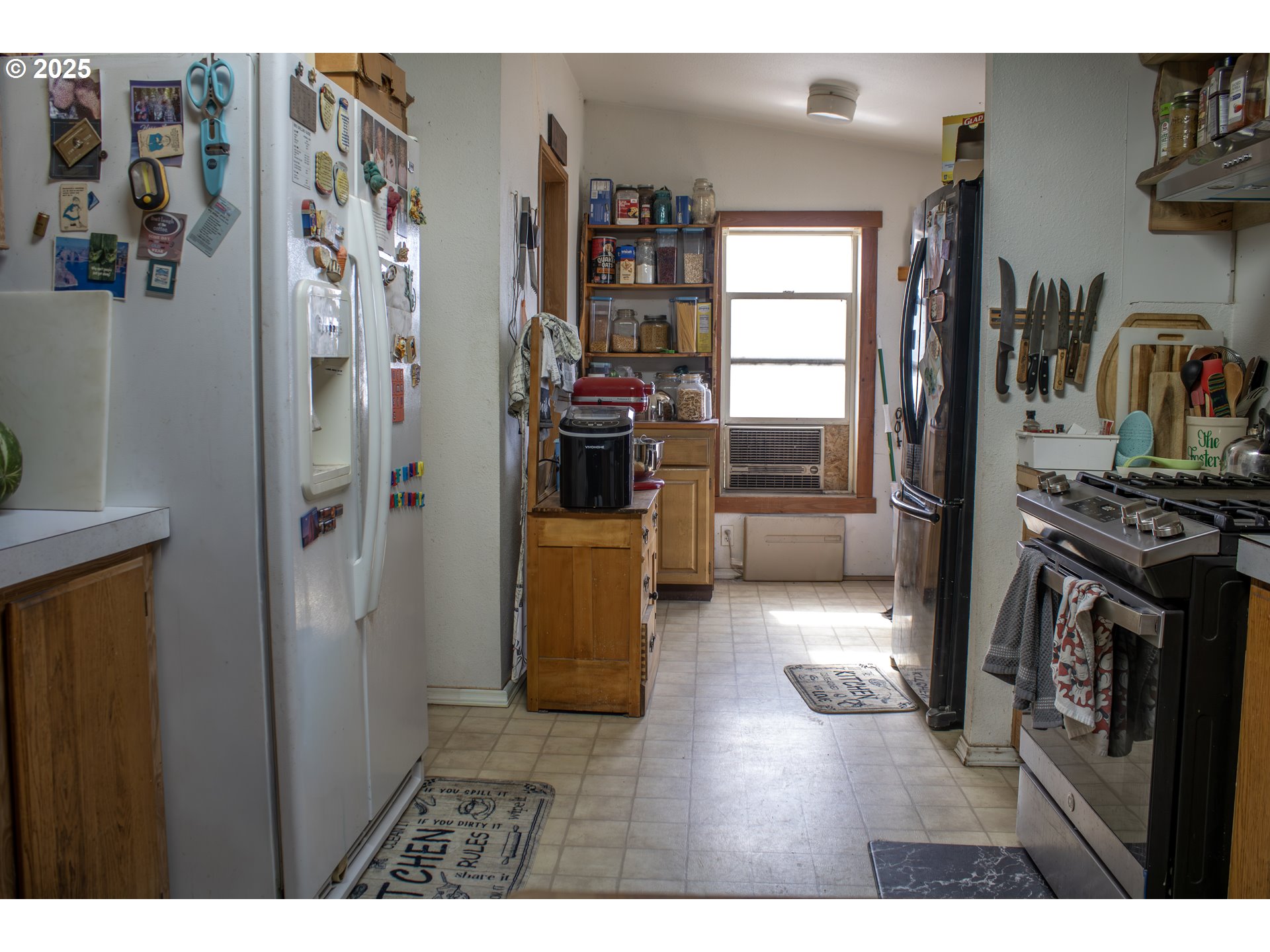 29388 Wrecking Yard Lane Hines, OR 97738 - Photo 34 of 39 a kitchen with stainless steel appliances granite countertop a refrigerator and a stove