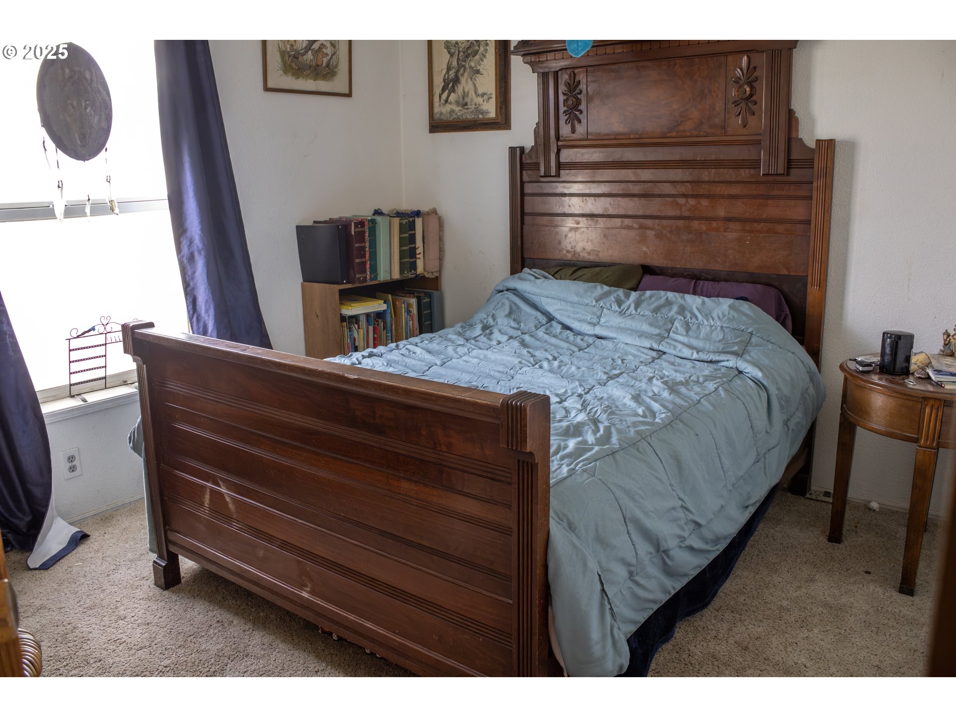 29388 Wrecking Yard Lane Hines, OR 97738 - Photo 38 of 39 a bedroom with a bed and cabinets