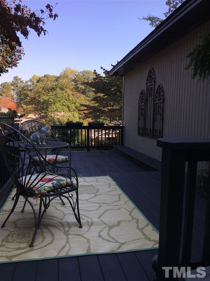 2850 Rue Sans Famille Raleigh, NC 27607 - Photo 2 of 24 a view of a chairs and table in patio