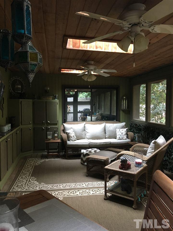 2850 Rue Sans Famille Raleigh, NC 27607 - Photo 13 of 24 a living room with furniture and a large window