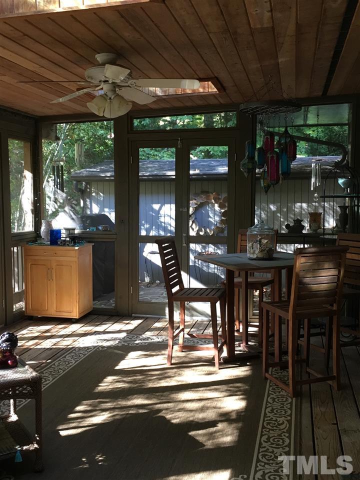 2850 Rue Sans Famille Raleigh, NC 27607 - Photo 15 of 24 a view of a chairs and table in the patio