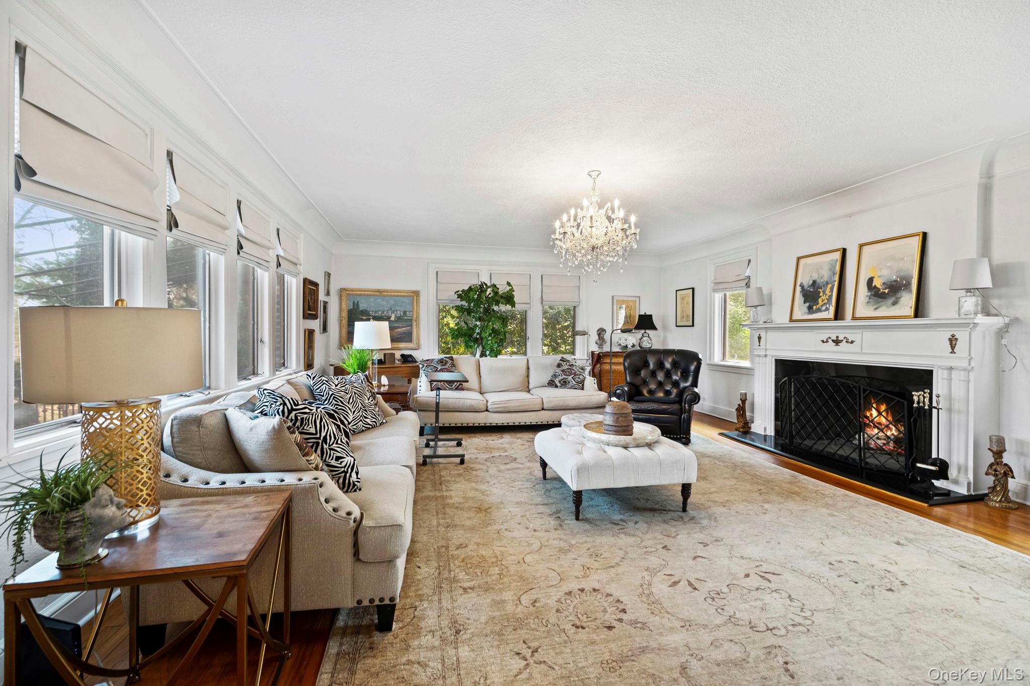 44 Fenimore Road New Rochelle, NY 10804 - Photo 5 of 46 a living room with furniture and a fireplace