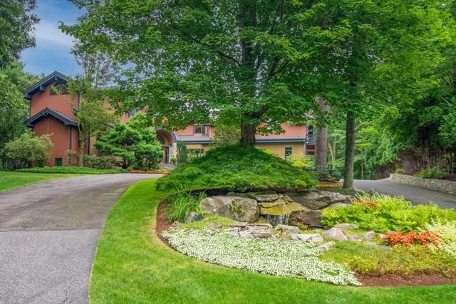 a backyard of a house with yard and garage