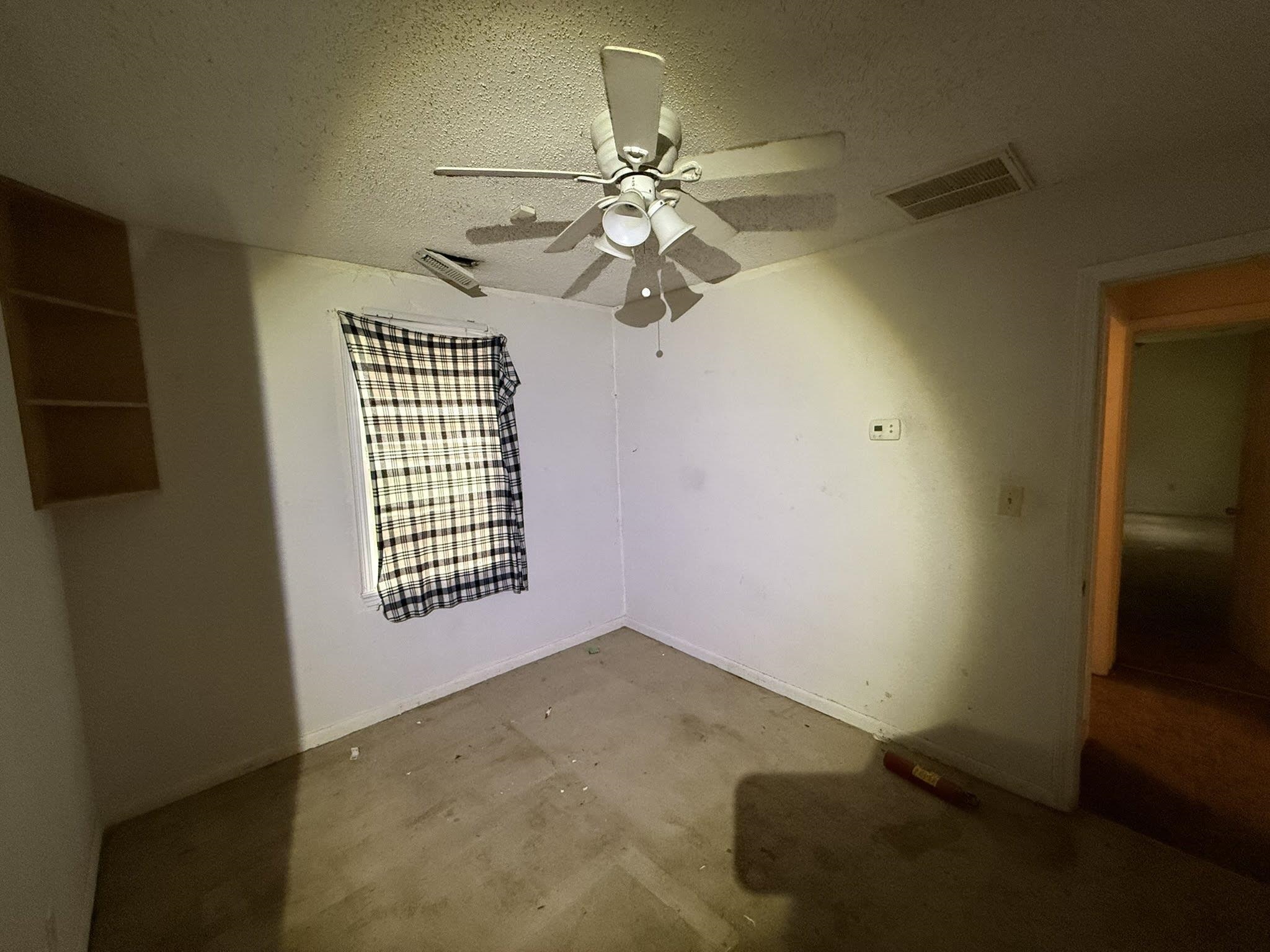 8488 Quito Road Millington, TN 38053 - Photo 21 of 30 a view of empty room with window