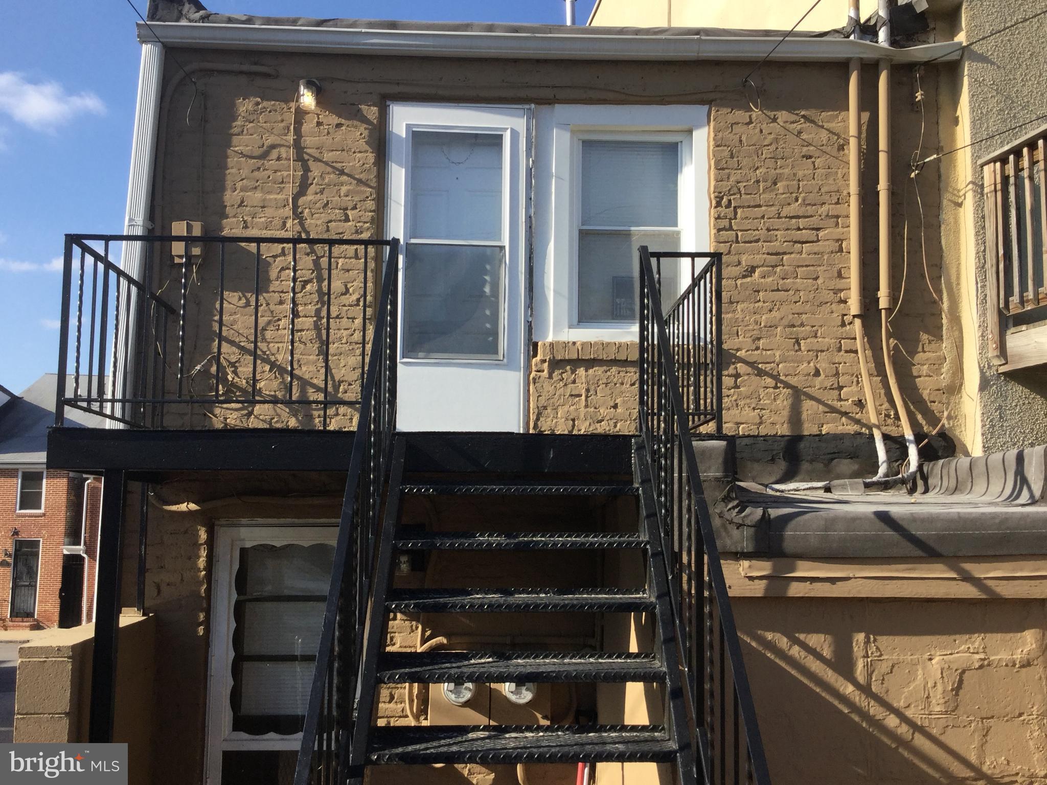 1725 Light Street Baltimore, MD 21230 - Photo 10 of 10 a view of building with wooden floor and a window