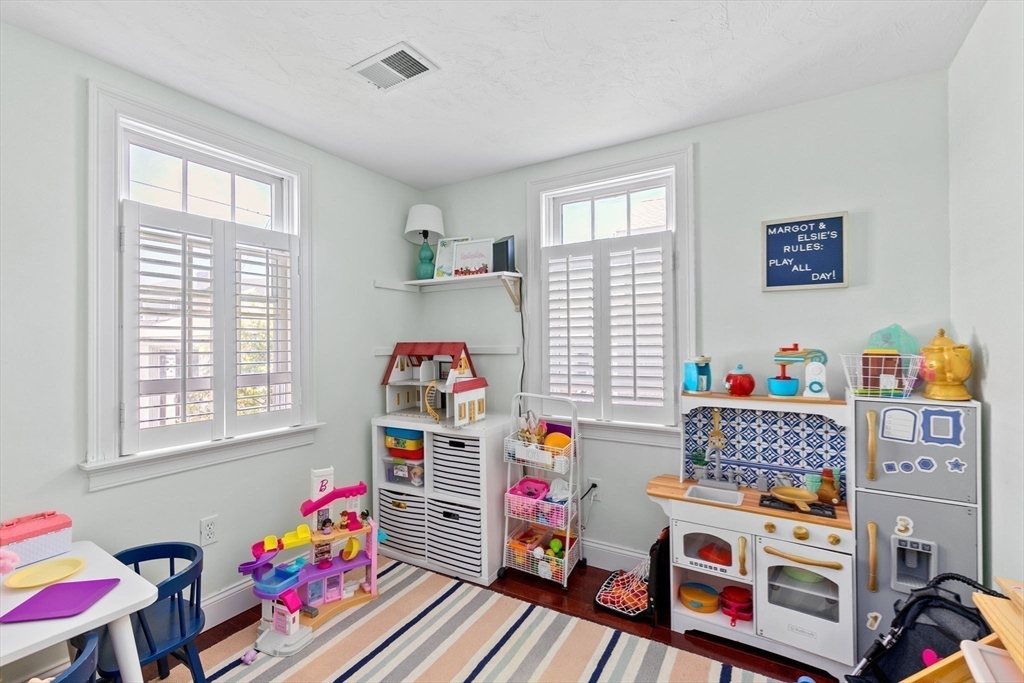 93 Marion Road Scituate, MA 02066 - Photo 9 of 14 a children room with toys and a window