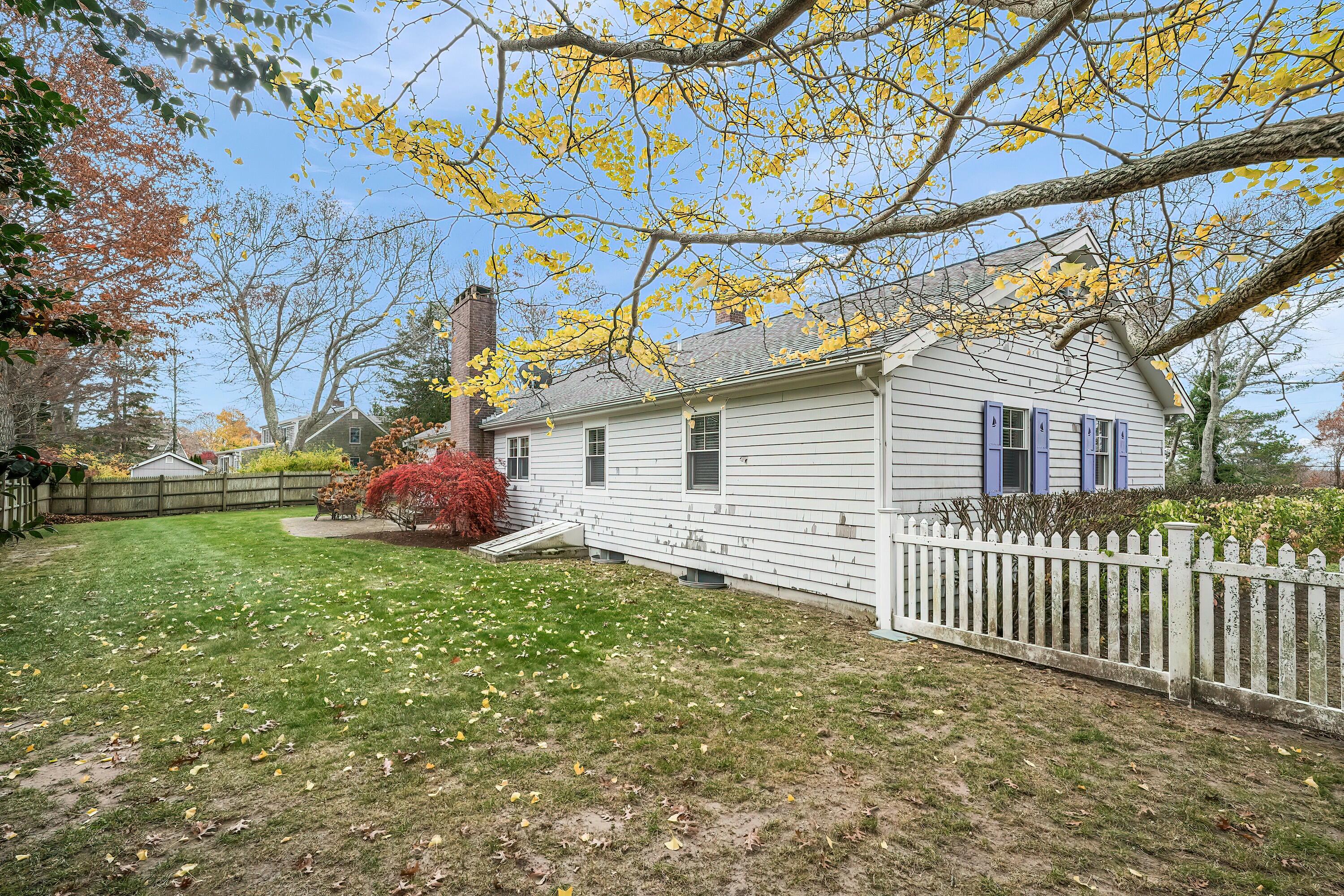 24 Beechwood Road Centerville, MA 02632 - Photo 33 of 33 a front view of a house with a yard