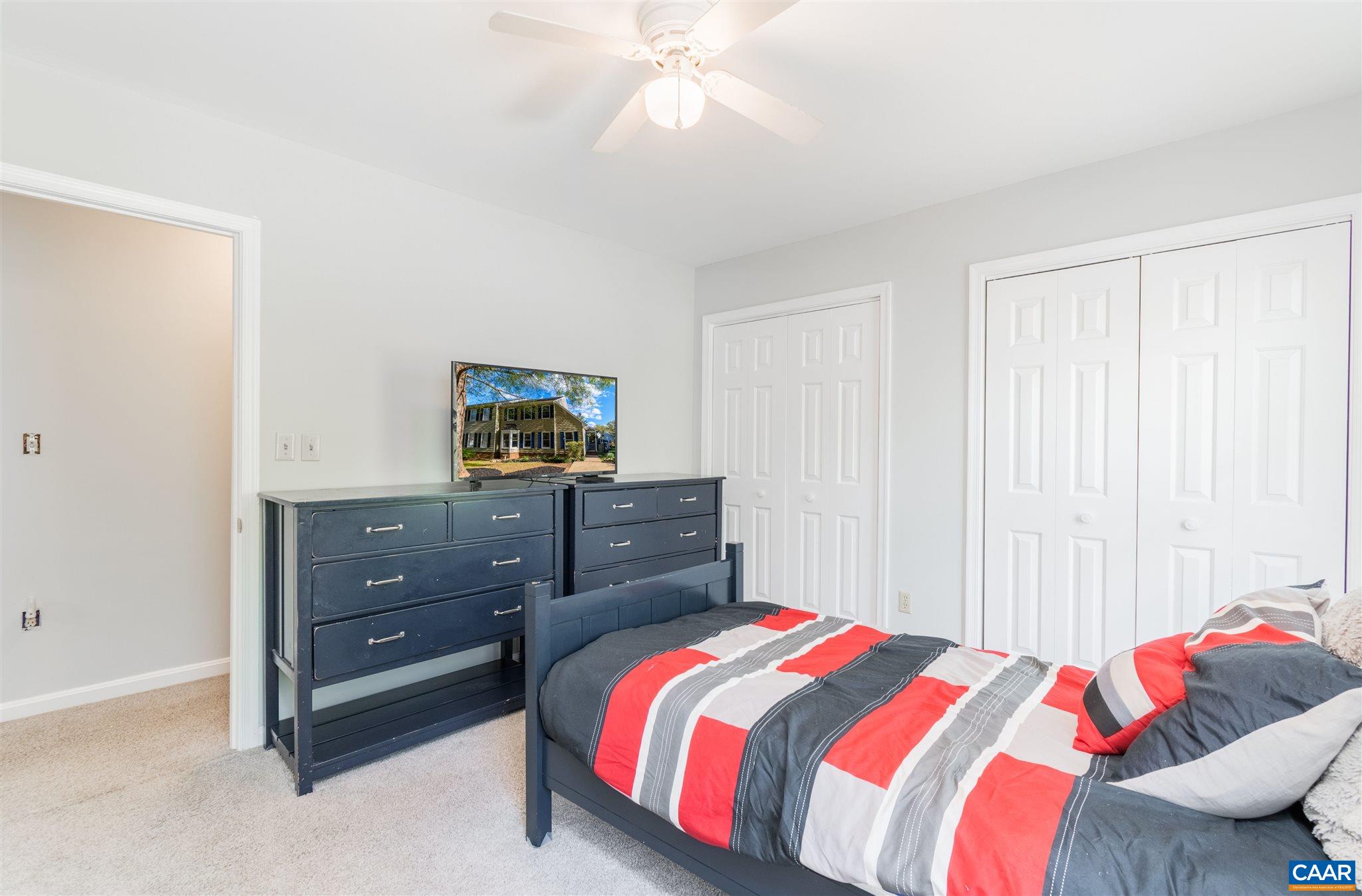342 Westfield Road Charlottesville, VA 22901 - Photo 19 of 23 a bedroom with a bed and a television