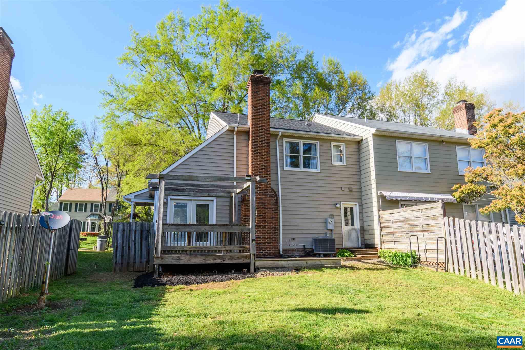 342 Westfield Road Charlottesville, VA 22901 - Photo 4 of 23 a front view of a house with a yard and garage