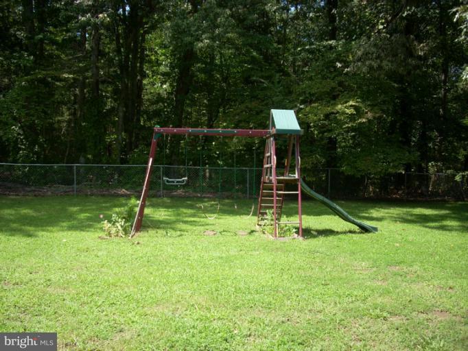9010 Indiantown Road King George, VA 22485 - Photo 8 of 19 View from Back of House/ Fenced Yard w/ Playground