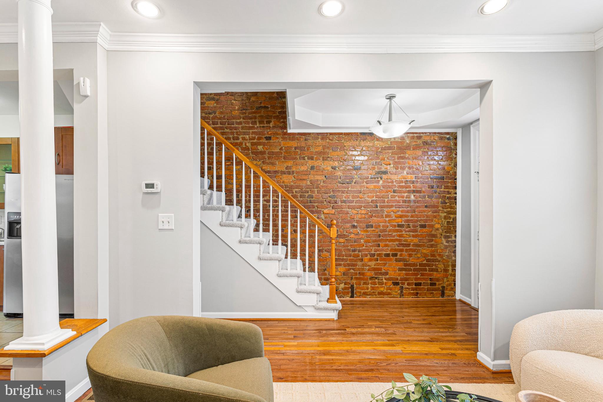 3028 Park Place Northwest Washington, DC 20001 - Photo 12 of 29 Charming entryway with exposed brick wall.