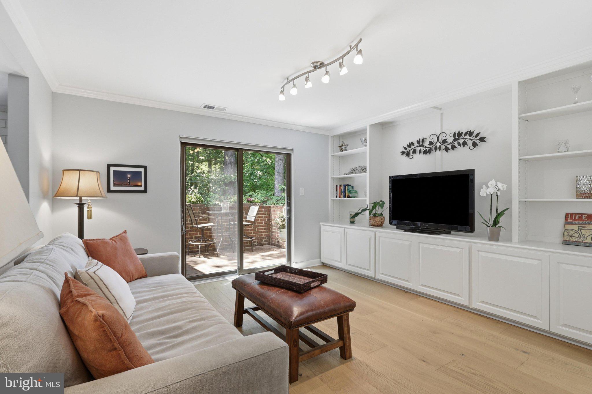 11615 Hunters Green Court Reston, VA 20191 - Photo 11 of 66 Living rm w/ private balcony & view of golf course