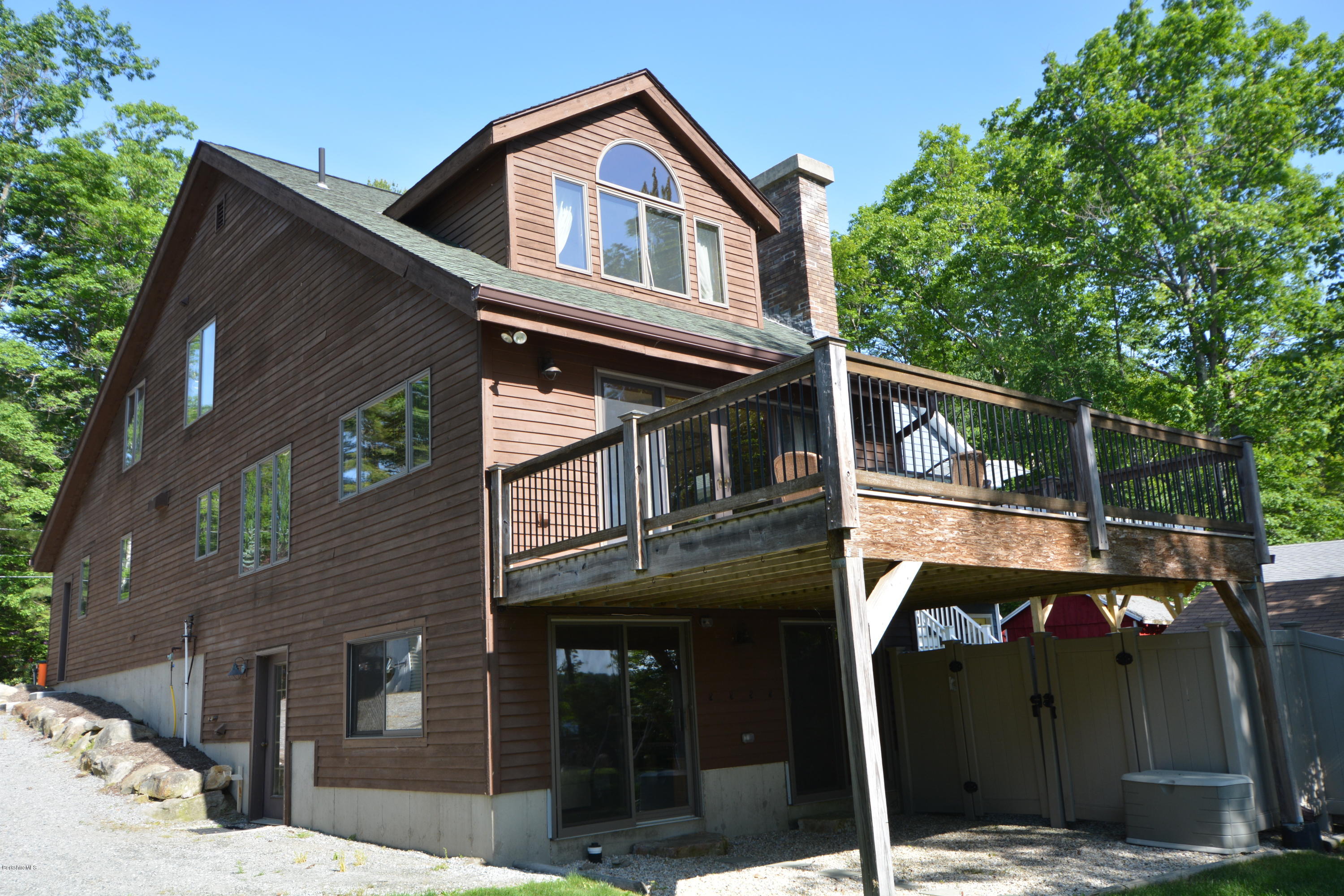 9 Old Stagecoach Road Otis, MA 01029 - Photo 1 of 17 a front view of a house with garage