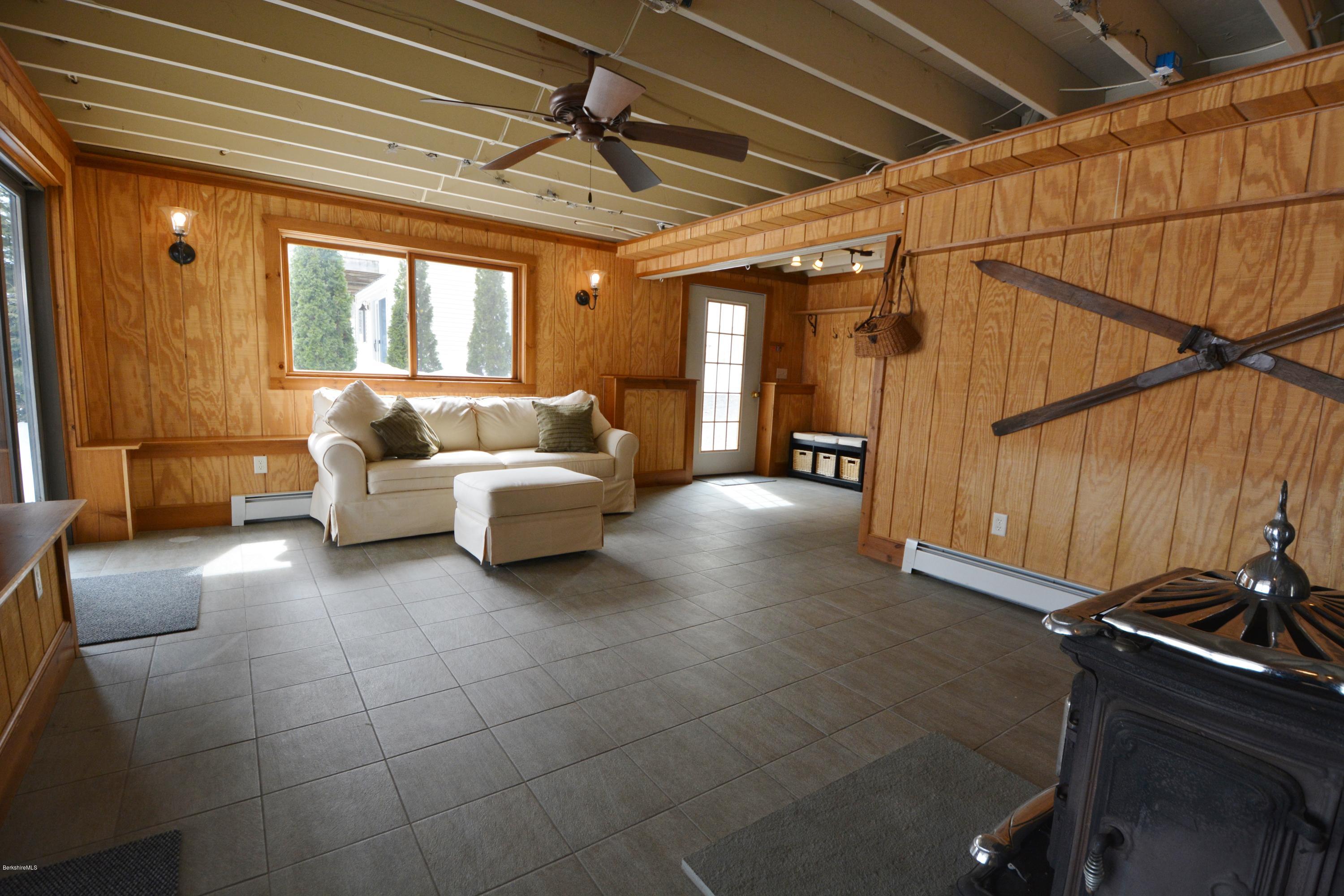 9 Old Stagecoach Road Otis, MA 01029 - Photo 14 of 17 a living room with furniture and a window