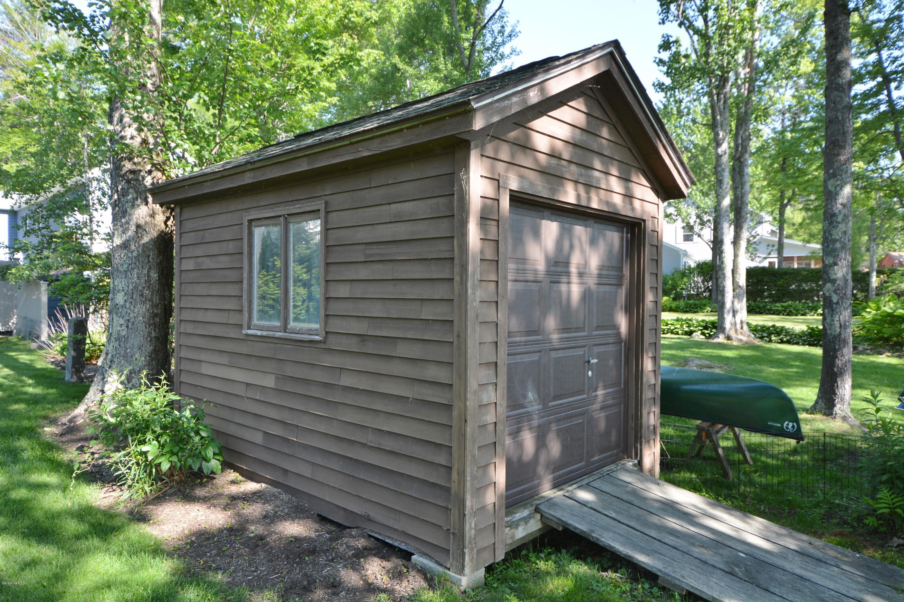 9 Old Stagecoach Road Otis, MA 01029 - Photo 15 of 17 a view of a house with a yard
