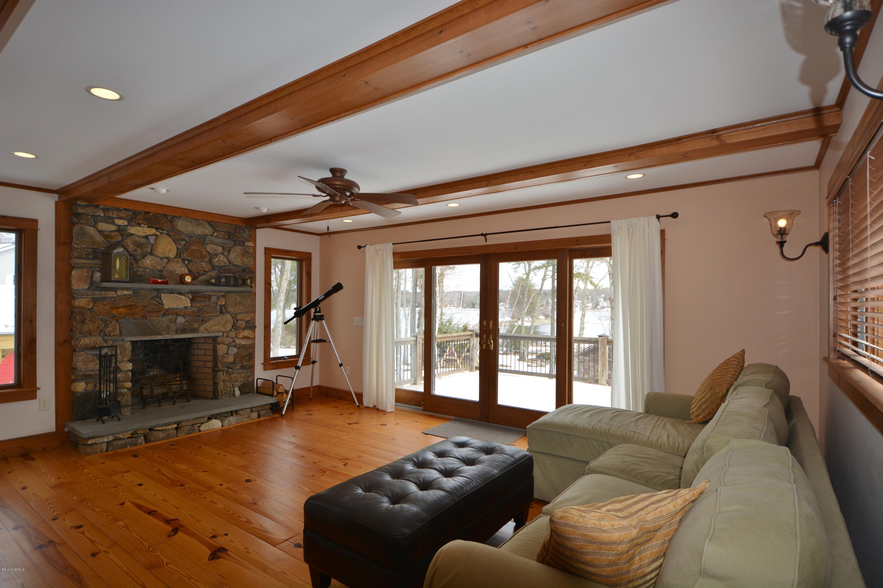 9 Old Stagecoach Road Otis, MA 01029 - Photo 7 of 17 a living room with furniture and a fireplace