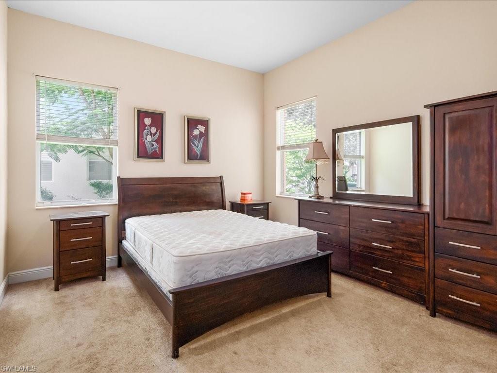 2055 Par Drive Naples, FL 34120 - Photo 14 of 32 a bedroom with a bed and window