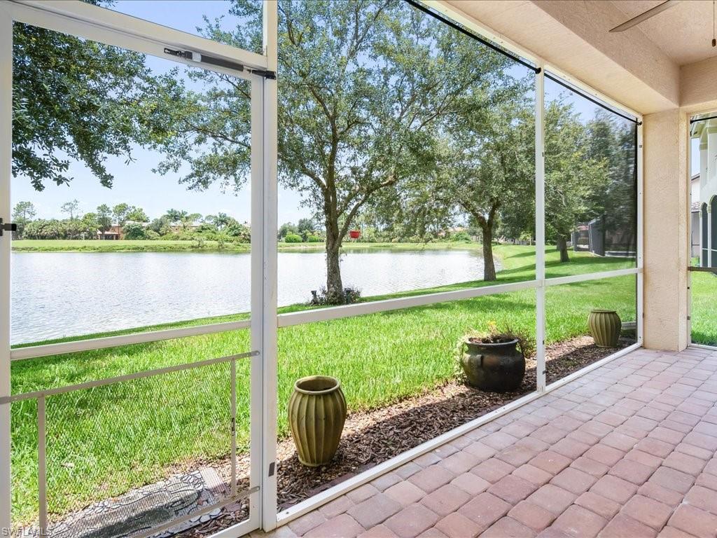 2055 Par Drive Naples, FL 34120 - Photo 27 of 32 a view of a back yard from a patio