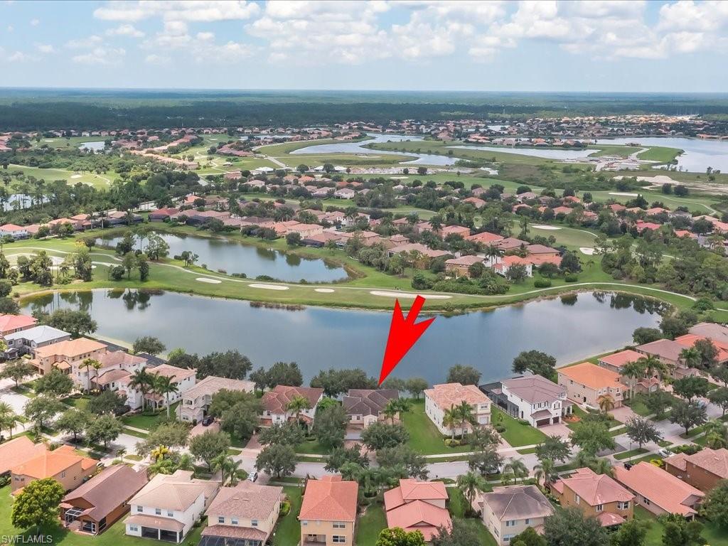 2055 Par Drive Naples, FL 34120 - Photo 28 of 32 a view of lake and city