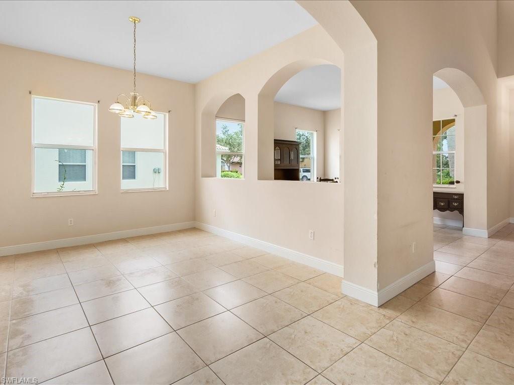 2055 Par Drive Naples, FL 34120 - Photo 3 of 32 a view of an empty room with a window
