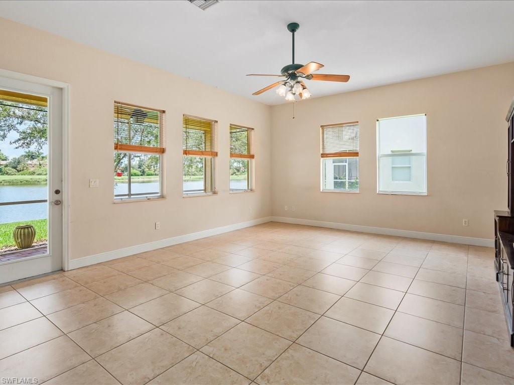 2055 Par Drive Naples, FL 34120 - Photo 8 of 32 a view of an empty room with a window