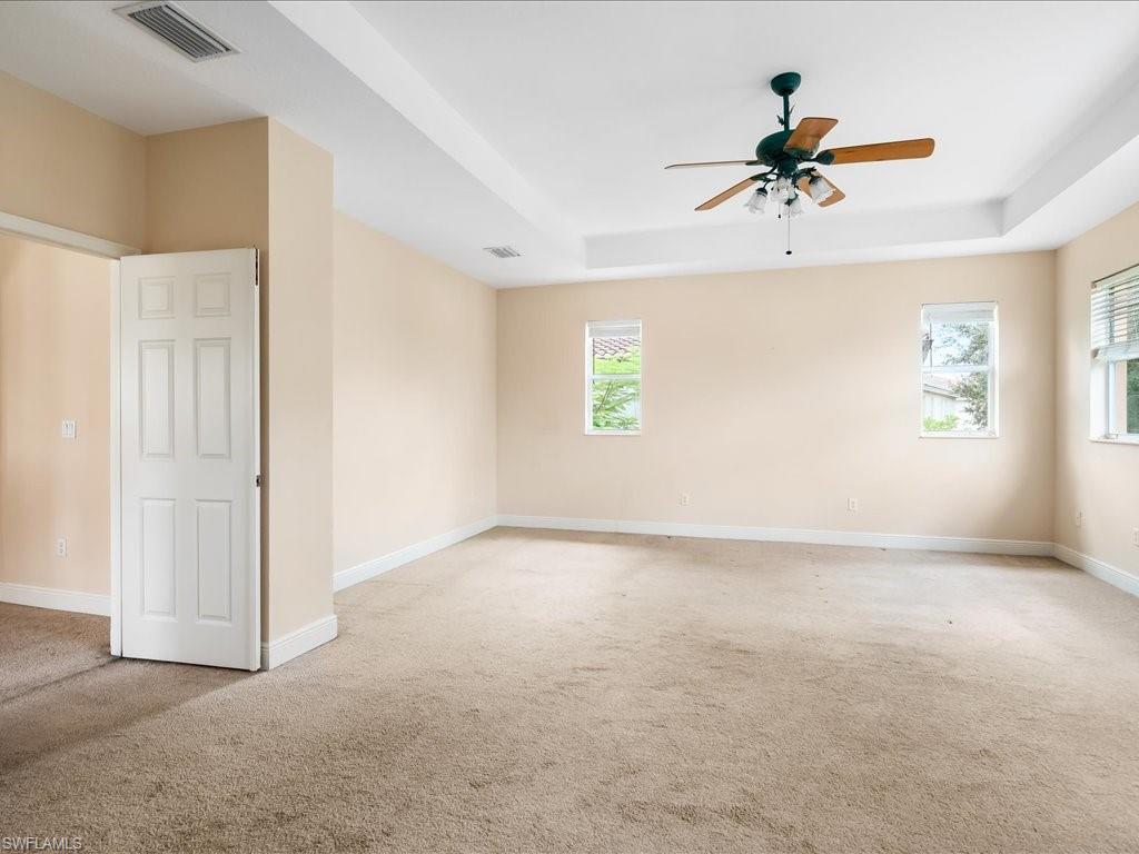 2055 Par Drive Naples, FL 34120 - Photo 9 of 32 a view of an empty room with a window