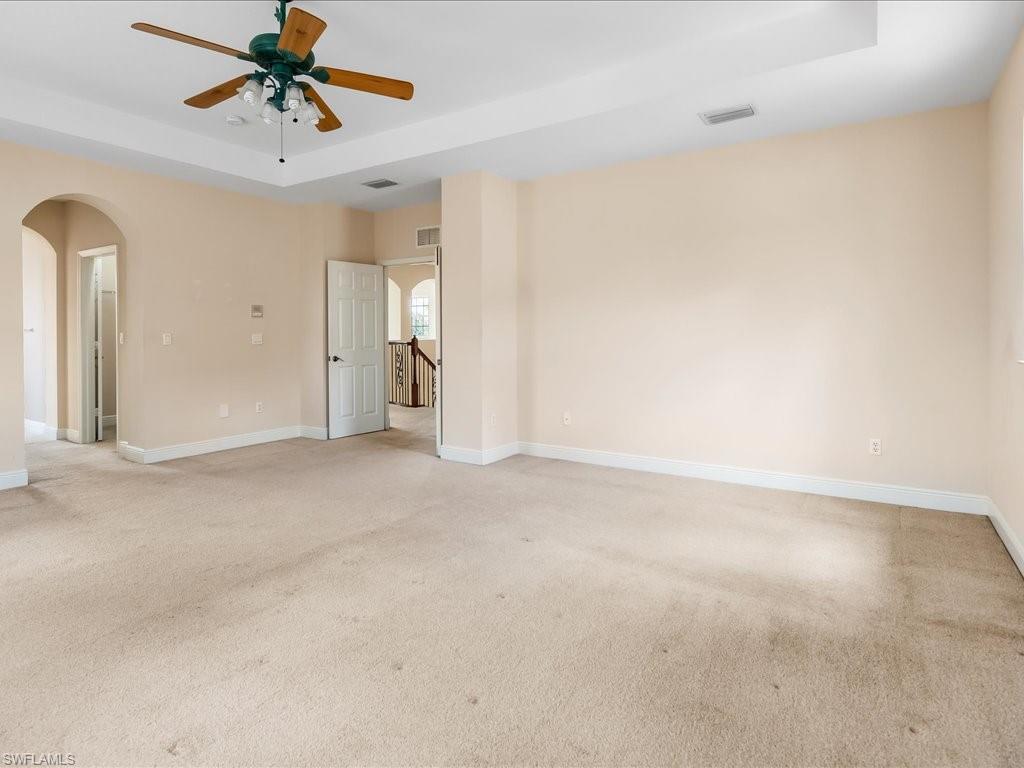 2055 Par Drive Naples, FL 34120 - Photo 10 of 32 a view of a livingroom with a ceiling fan and window